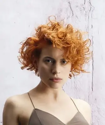Cursore asimmetrico per capelli corti, medi, lunghi (con foto e video)